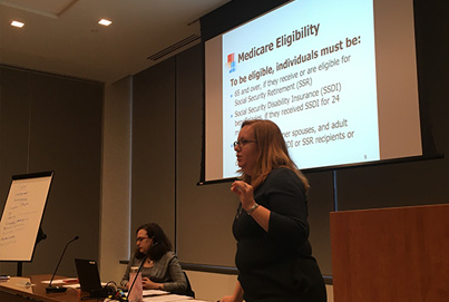 Woman speaking at meeting